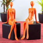 Load image into Gallery viewer, Orange & Black Fibre Lady On A Block Showpiece