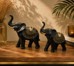 Load image into Gallery viewer, Royal Black Elephant Showpiece Set – Premium Resin Decorative Figurines | Luxury Home Décor (Set of 2)