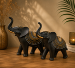 Load image into Gallery viewer, Royal Black Elephant Showpiece Set – Premium Resin Decorative Figurines | Luxury Home Décor (Set of 2)