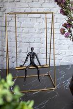 Load image into Gallery viewer, Black &amp; Gold Metal &amp; Polyresin Leisure Man Sculpture
