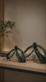 Load and play video in Gallery viewer, Sculpted Glass Loop Décor – Modern Abstract Art Statement (Premium Finish)